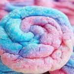 Colorful cotton candy cookies on a plate, perfect for parties and celebrations.