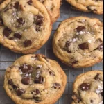 Crispy and chewy chocolate chip cookies on a cooling rack