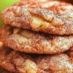 Freshly baked apple cinnamon snickerdoodle cookies on a plate