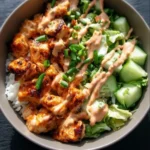 Delicious Bang Bang Chicken Bowl with colorful ingredients and vibrant presentation