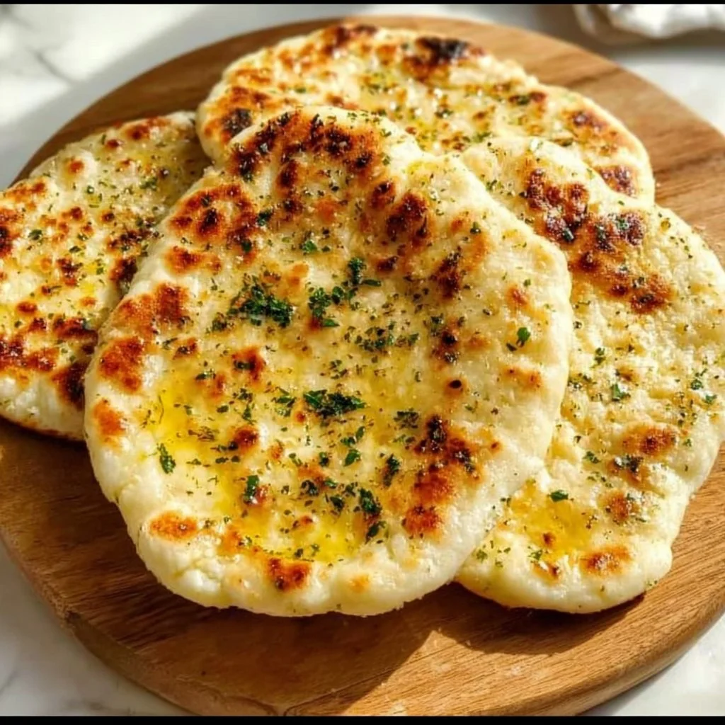 Homemade cottage cheese flatbreads topped with fresh herbs and spices
